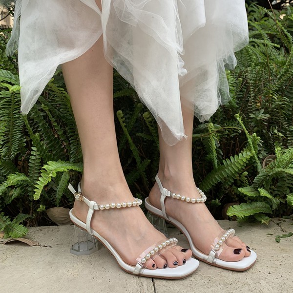 2021 summer new one line belt pearl sandals female summer fairy temperament crystal medium thick heel cowhide women's shoes 