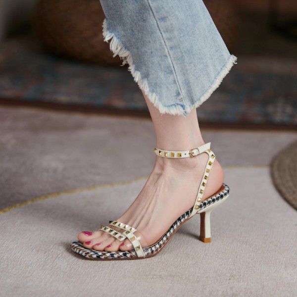 Summer one line buckle sandals women's fashion middle heel 2021 new European and American style square head rivet thin heel high heels