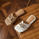 Fairy style metal accessories sandals women wear out 2021 summer new Korean lazy comfortable flat bottomed beach shoes 