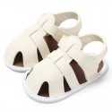 Baotou children's sandals 2021 summer new Pu leisure breathable baby sandals men's solid color shoes directly supplied by manufacturers